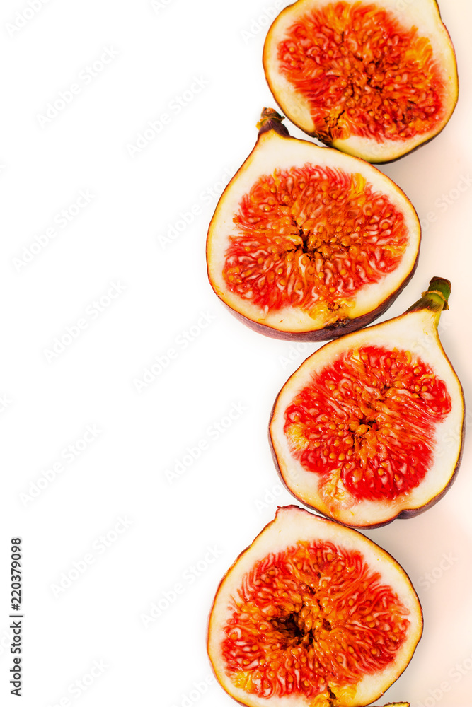 Fresh figs. Fruit with half isolated on white. Fresh figs. Fruit with half isolated on white.