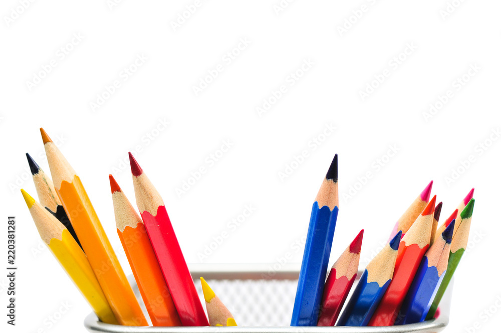 Colored pencils in pencil case isolated on white background.
Colored pencils in pencil case isolated on white background.