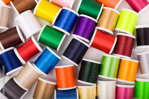 Set of colorful thread spools.