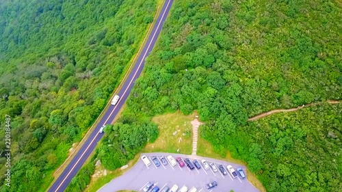 Fast motion view of the Mount Mitchel State car park below following a van. photo