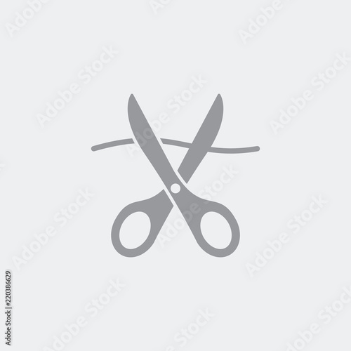 Scissors cutting thread
