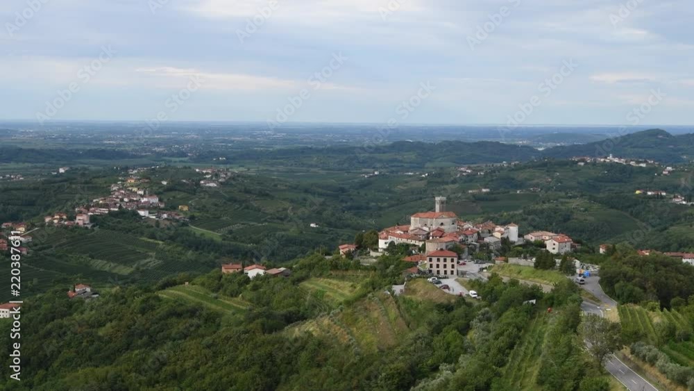 Panoramic view of Smartno in Gorska Brda, Slovenia from above with surrounding vineyards, olive plantations and orchards. Panoramic view of Smartno in Gorska Brda, Slovenia from above with surrounding vineyards, olive plantations and orchards.