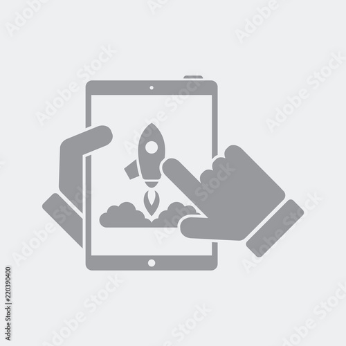 Tablet icon with a rocket