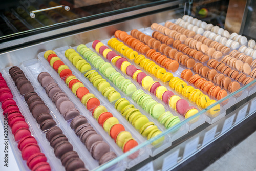 macarons in showcase of pastry in France.