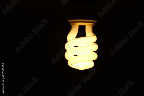 light bulb against black 