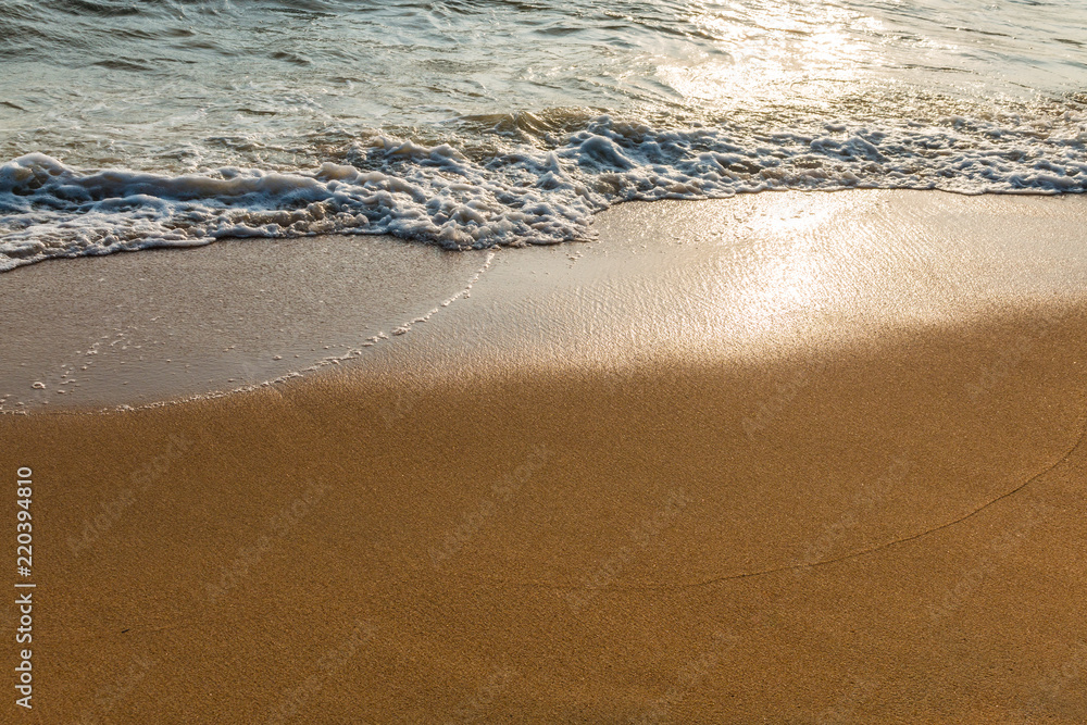 Wave of the sea on the sandy beach Wave of the sea on the sandy beach
