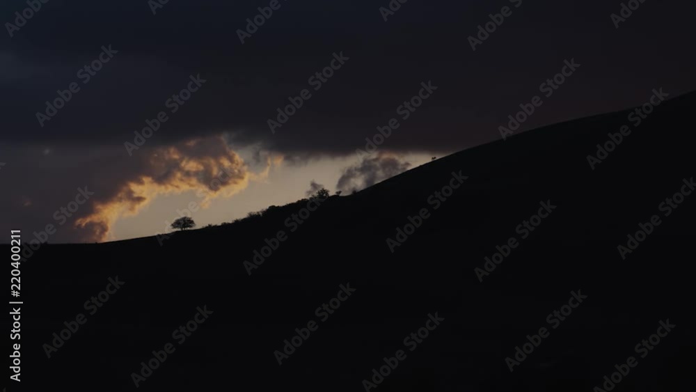 Dramatic weather time lapse in hills at dusk Dramatic weather time lapse in hills at dusk