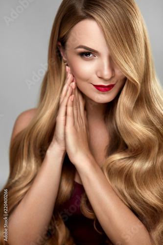Hair Beauty. Beautiful Woman With Makeup And Long Blonde Hair