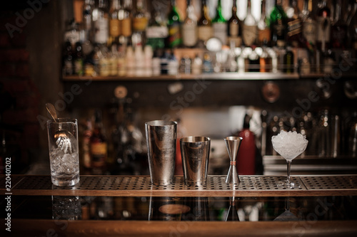 Set of necesary barman equipment on the bar counter