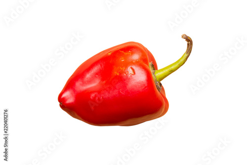 Natural red bell pepper from the garden, isolated on white background