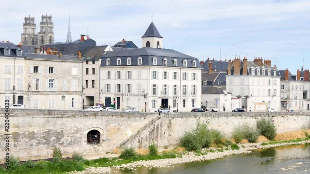 Bank of the loire, in Orléans, city of France, during the summer. We can see the cathedral, and historic buildings. Horizontal panorama. Bank of the loire, in Orléans, city of France, during the summer. We can see the cathedral, and historic buildings. Horizontal panorama.