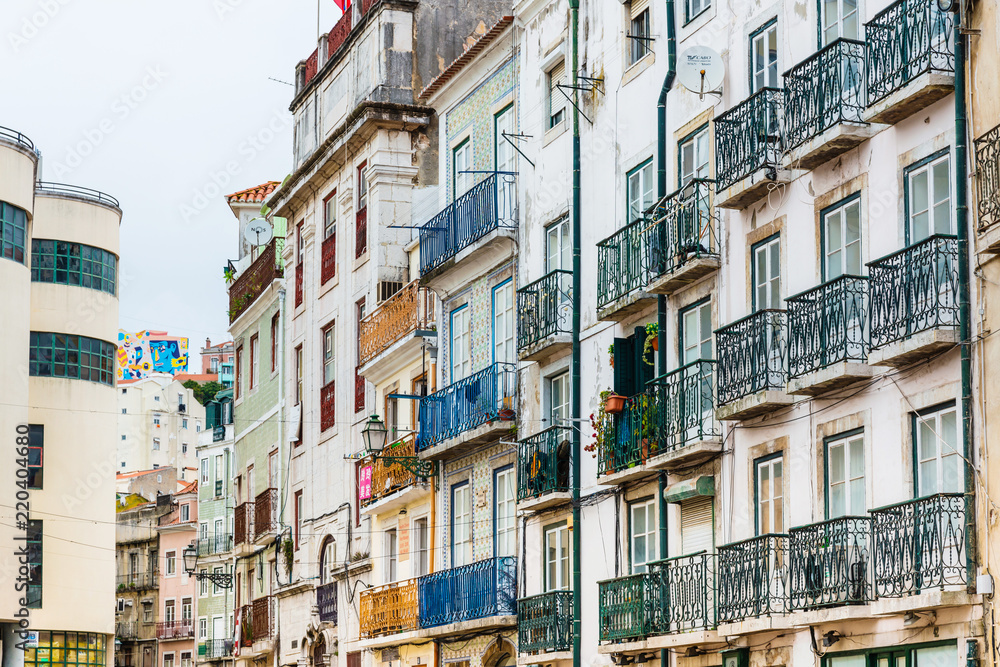 Lisbon, Portugal.- February 11, 2018: Old Town Lisbon. street view of typical houses in Lisbon, Portugal, Europe