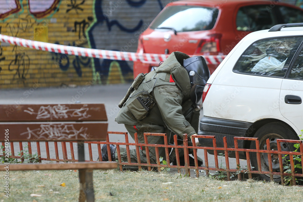 Bomb Disposal Expert in Bomb suit for Explosive ordnance disposal