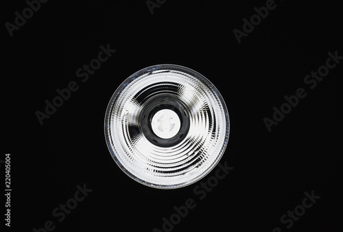 CFL Light Bulb in the Dark Ceiling background