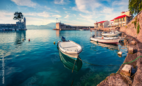 Colorful spring view of the Nafpaktos port. Fantastic morning scene of the Gulf of Corinth, Greece, Europe. Beauty of countryside concept background. Beauty of countryside concept background. photo
