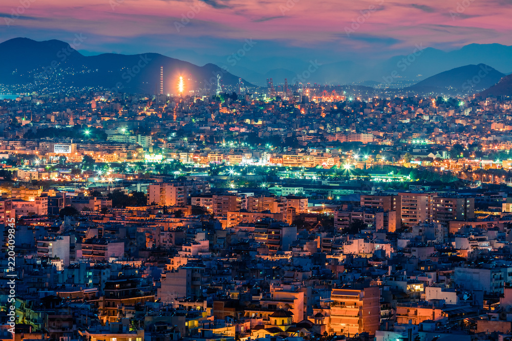 Colorful evening view of Athens, capital of Greece, Europe. Fantastic spring sunset in the big sity. Traveling concept background. Artistic style post processed photo.
