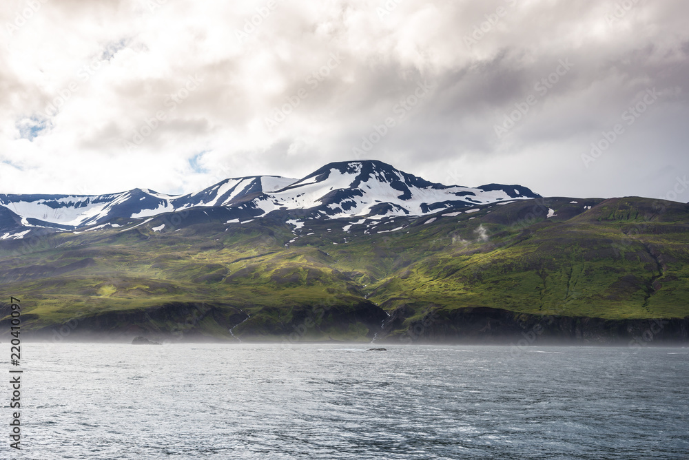typical icelandic Mountains, view from boat at Húsavík husavik while Whale Watching