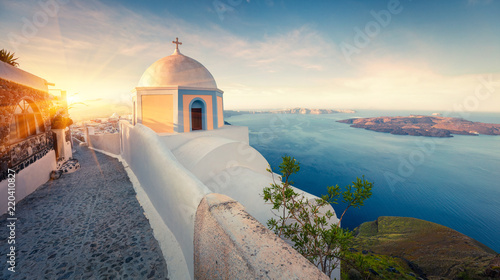 Fototapeta Naklejka Na Ścianę i Meble -  Sunny morning panorama of Santorini island. Picturesque spring sunrise on the famous Greek resort Thira, Greece, Europe. Traveling concept background. Artistic style post processed photo.