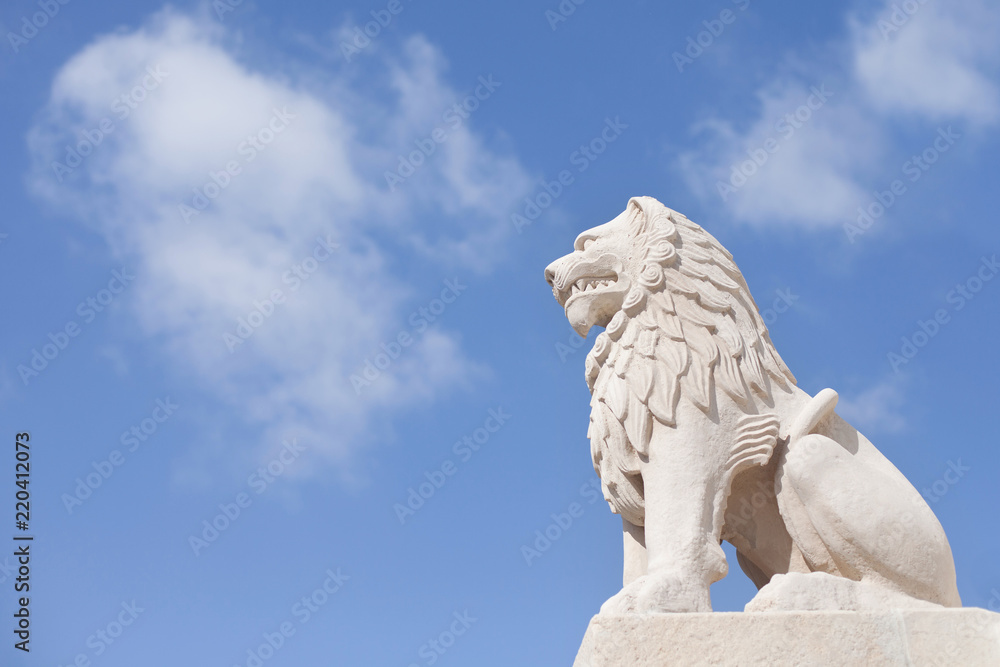 a large stone lion. 