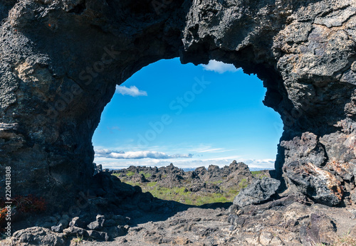 Lava window at Dimmuborgir, Myvatn area - Iceland. The Dimmuborgir area is composed of various volcanic caves and rock formations, reminiscent of an ancient collapsed citadel.