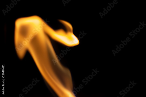 Isolated flame of the ethanol fireplace in the dark