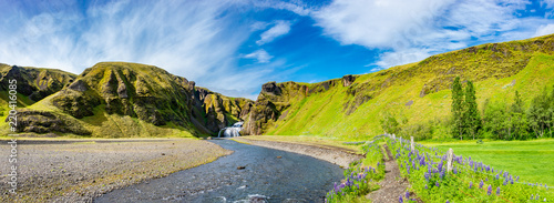 Magical big waterfall called Stjornarfoss near Kirkjubaejarklaustur at Iceland South coast photo