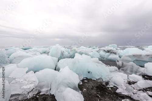 Jökulsárlón glacier lagoon with ice rocks in the water and beach, jökulsarlon © chrislhasl