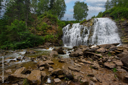 Russia. Altai territory. Waterfall on the river Pescherka