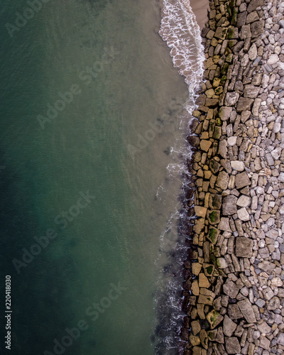 Aerial view of a beach and rocks
