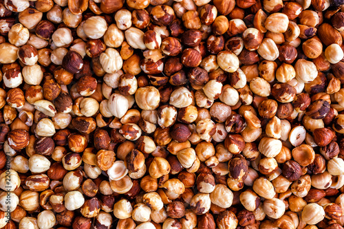 Nut background of hazelnut fruits. Food background. Top view of hazelnut nuts.