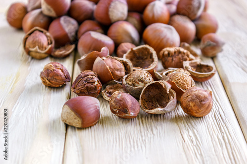 whole hazelnuts on the background of a wooden table