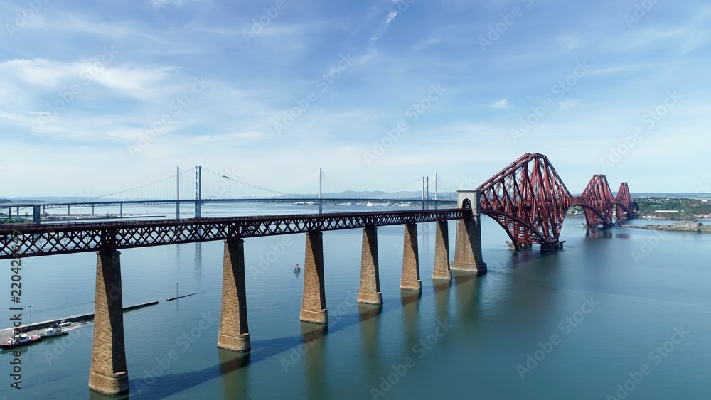 Aerial view of the Forth Railway Bridge near Edinburgh. A huge Victorian cantilever construction and now a World Heritage Site. Aerial view of the Forth Railway Bridge near Edinburgh. A huge Victorian cantilever construction and now a World Heritage Site.