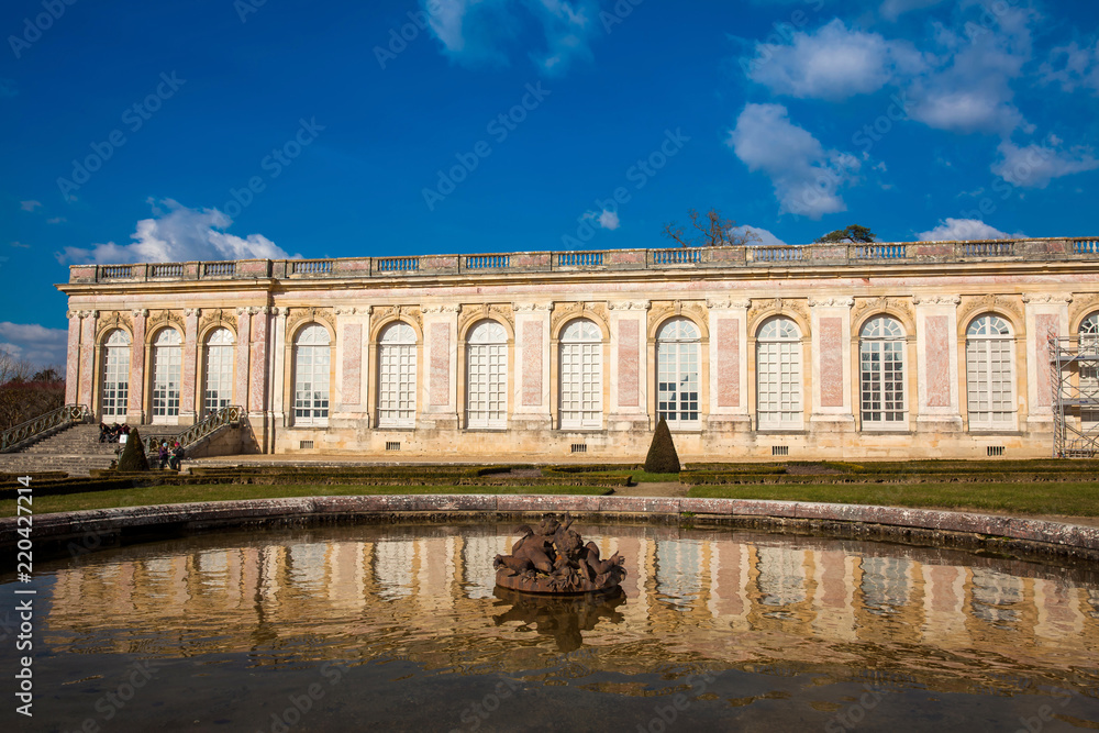 PARIS, FRANCE - MARCH, 2018: The  Grand Trianon at the Versailles Palace in a freezing winter day just before spring