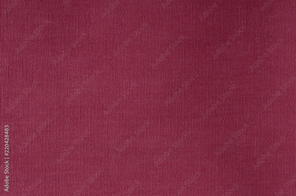 Maroon fabric background.
Maroon fabric background.