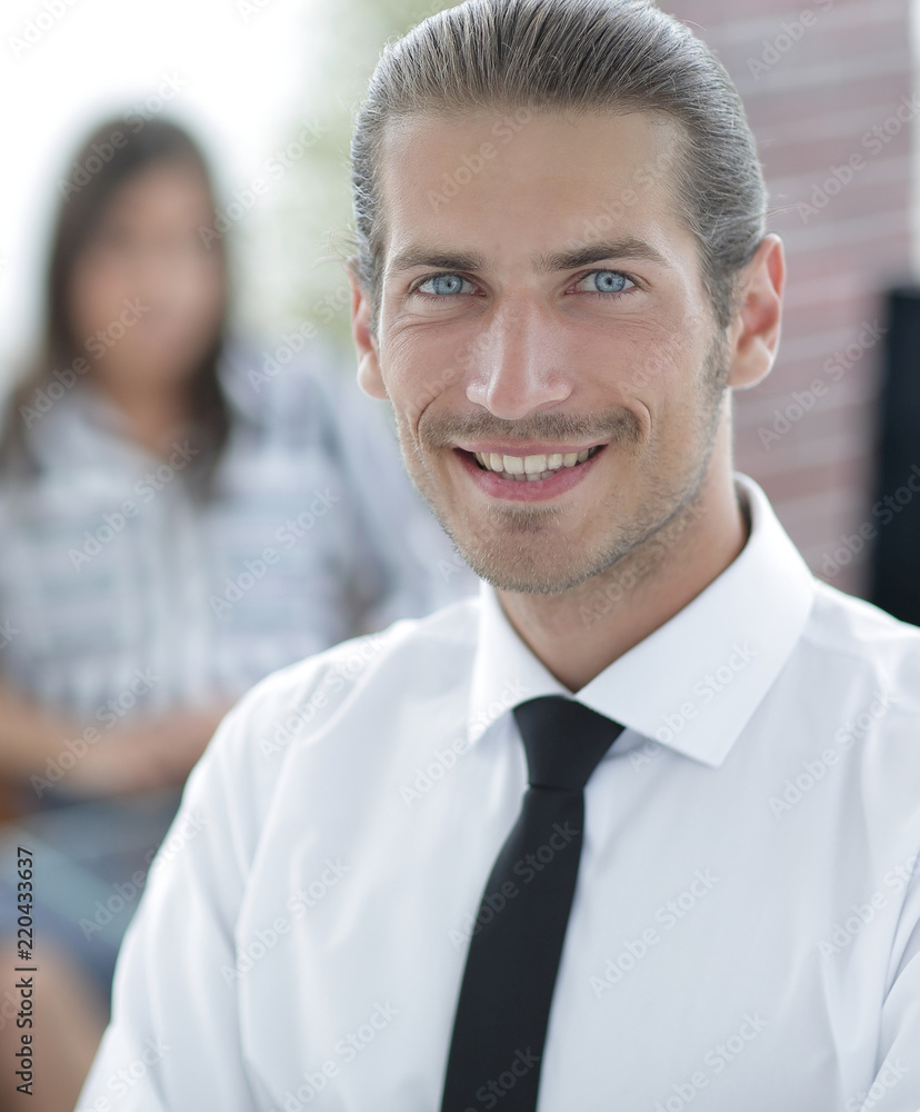 successful young business men on blurred background