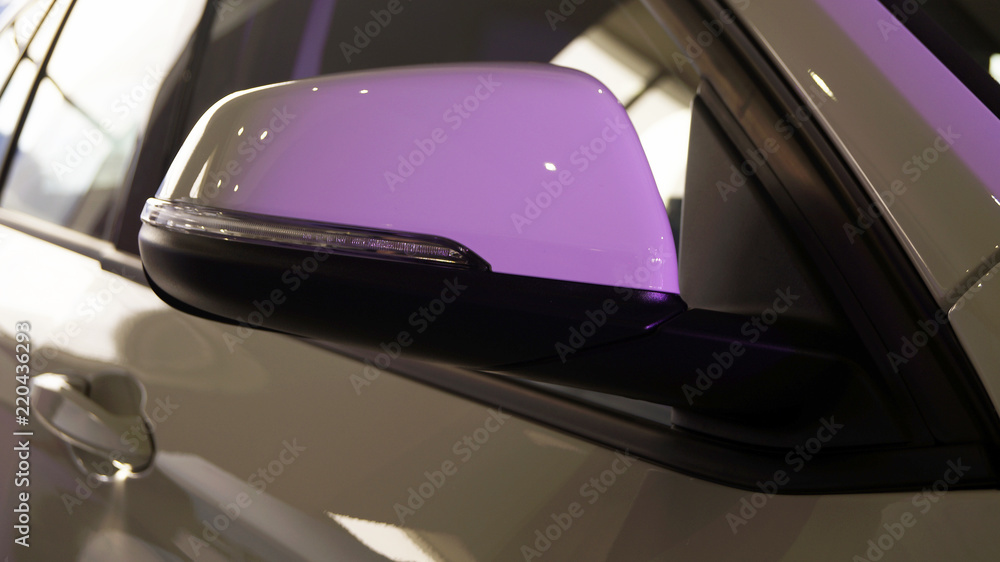 side mirror of a modern car with backlight