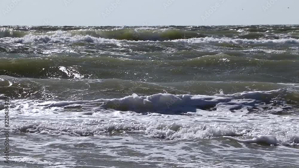 Soft wave of blue ocean on sandy beach. Background. Soft wave of blue ocean on sandy beach. Background.