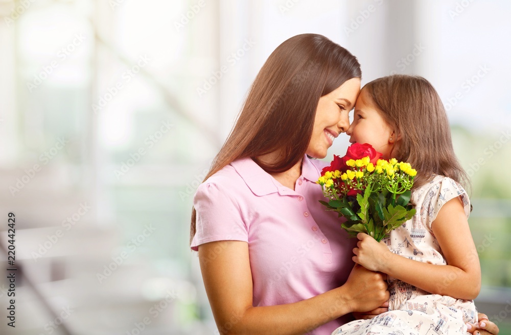 Happy Mother and daughter hugging Happy Mother and daughter hugging