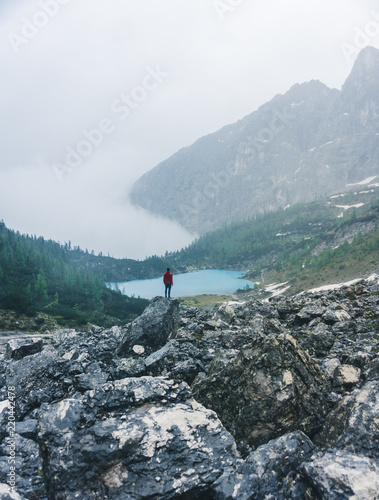 Lago di Sorapiss with amazing turquoise color of water. The mountain lake in Dolomite Alps. Italy photo