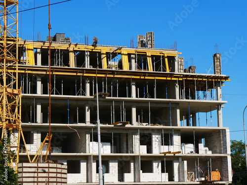 Construction site background. Concrete building under construction.