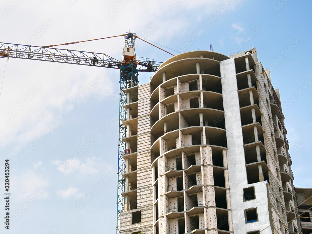 Skyscraper construction.Construction site with crane and building. Skyscraper construction.Construction site with crane and building.