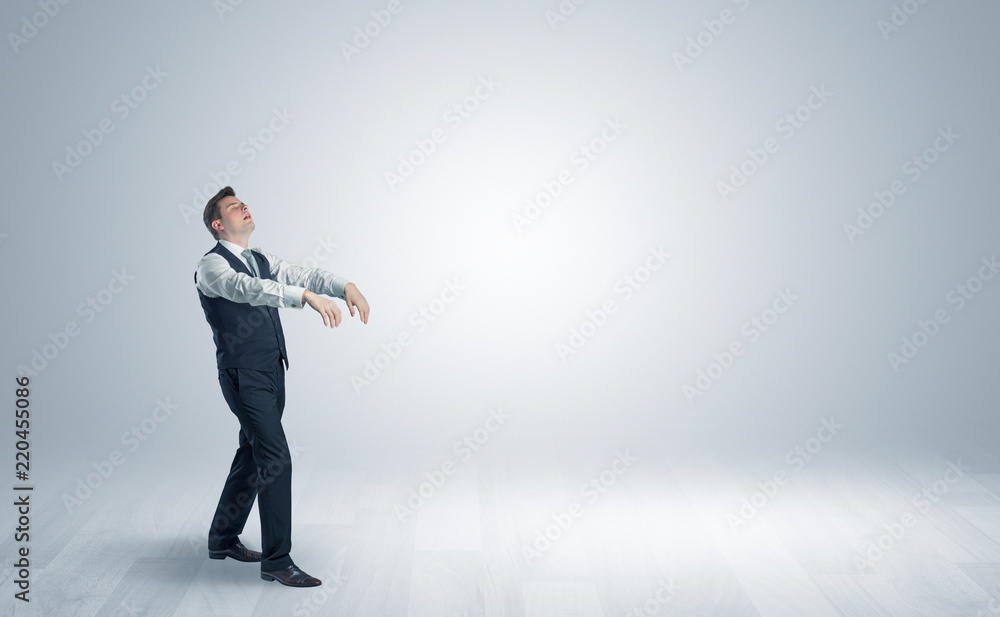 Zombi, sleepy maniac businessman walking in a copy space
Zombi, sleepy maniac businessman walking in a copy space