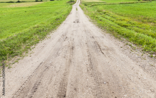 sandy with gravel road