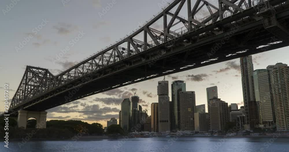 day to night time lapse of city view under story bridge day to night time lapse of city view under story bridge