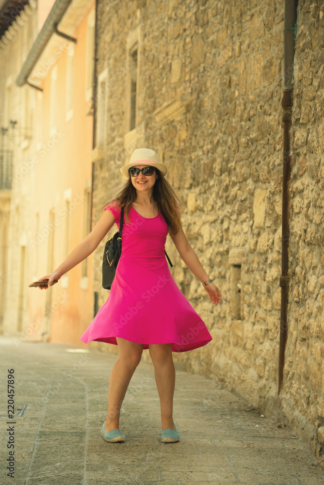 A beautiful touristic girl visiting the city of San Marino, travel and vacation A beautiful touristic girl visiting the city of San Marino, travel and vacation