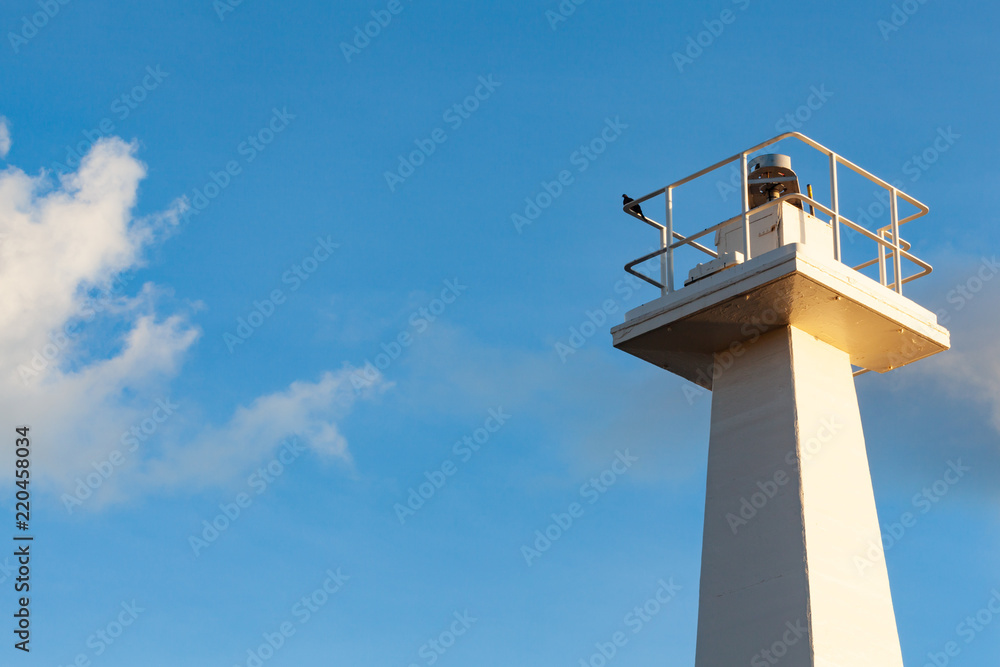 The Lahaina Lighthouse in Lahaina, Maui, Hawaii Against a Blue Sky with Clouds and Copy Space The Lahaina Lighthouse in Lahaina, Maui, Hawaii Against a Blue Sky with Clouds and Copy Space