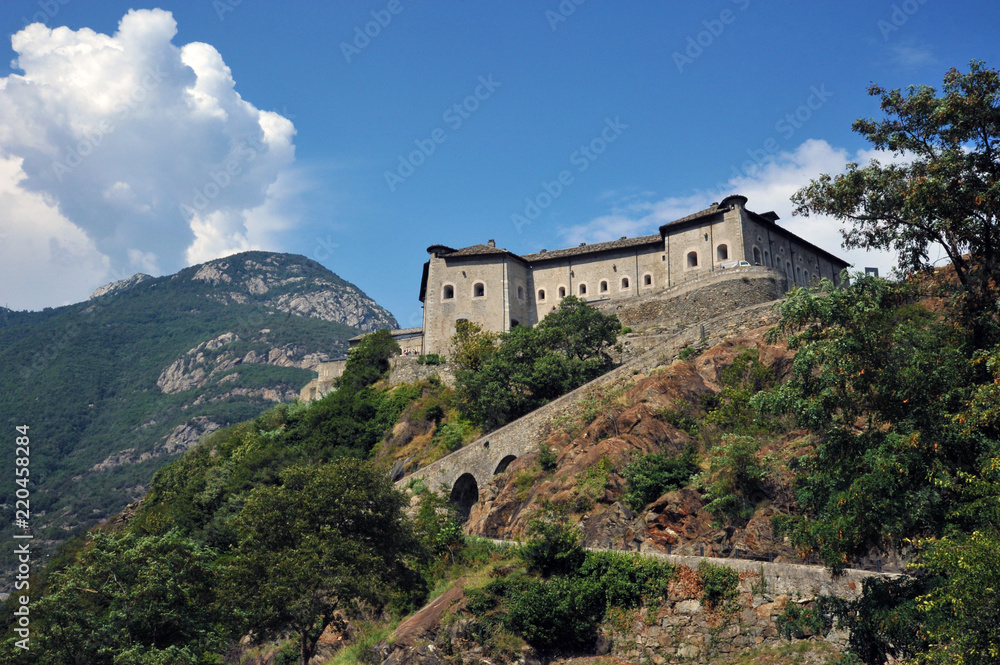 Fort Bard, Valle d'Aosta, Italy - August 21, 2018: Historic military construction defense Fort Bard. Medieval fortress in Italian Alps.