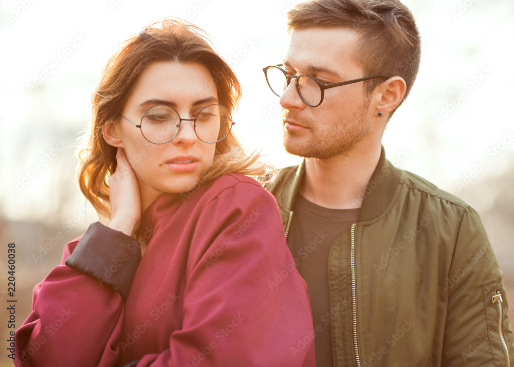 fashion couple in love embrace at sunset fashion couple in love embrace at sunset