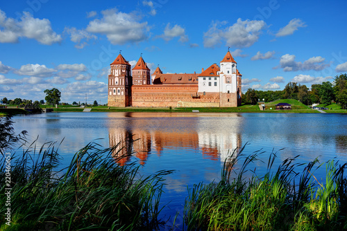 The Mir Castle, reflected in the lake. Belarus, Europe
