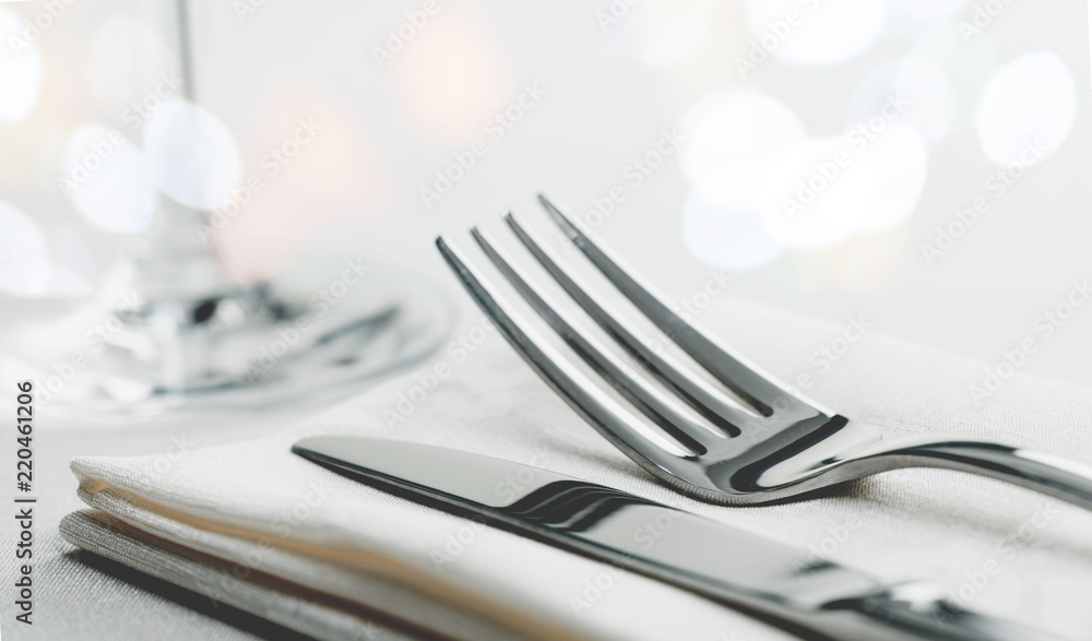 Table Setting with Fork and Knife on Napkin - obrazy, fototapety, plakaty 
